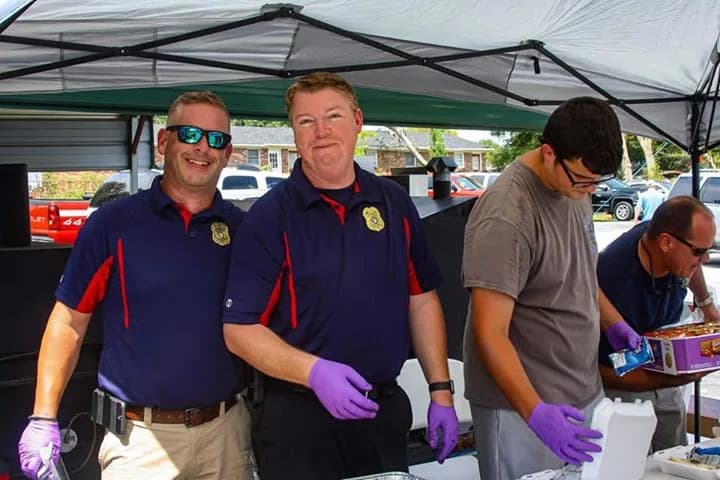 Local first responders volunteering at a C.A.N. event tent